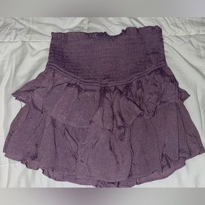 Lavender type of color skirt. Wore a couple times and got to small